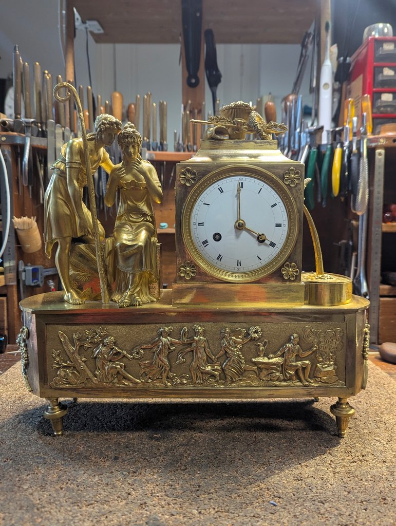 Pendule Empire aux bergers bronze doré — atelier horlogerie Bordeaux
